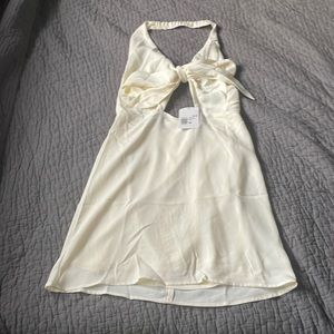 NWT cream halter mini dress with bow Medium